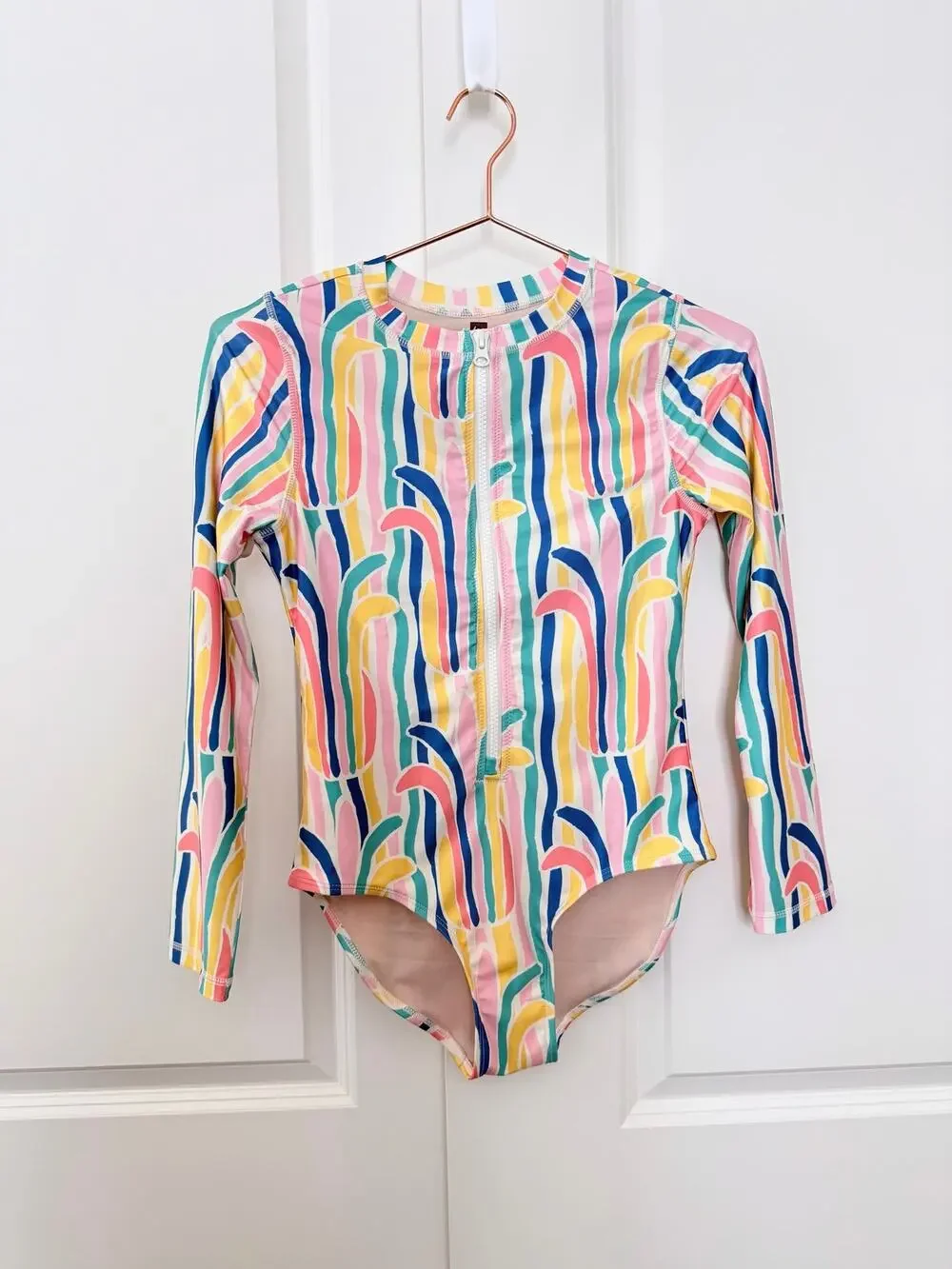 Tea Collection rainbow pineapple abstract print zip front swimsuit rashguard